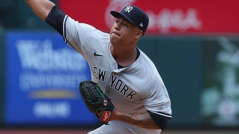 Frankie Montas of the Yankees delivers a pitch against the...