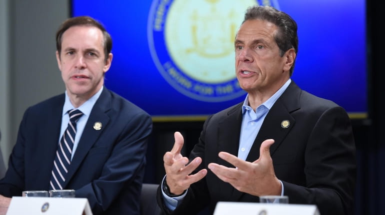 Gov. Andrew M. Cuomo with state Health Commissioner Howard Zucker.