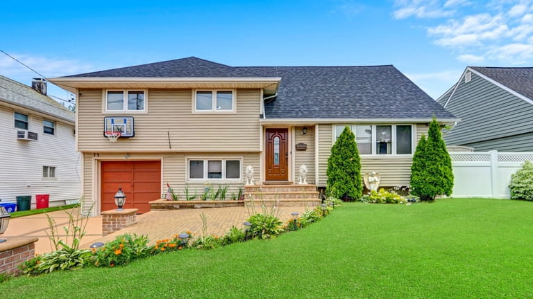Priced at $889,000, this split-level on Irma Drive features a...