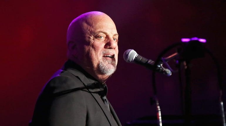 Billy Joel takes the stage at Madison Square Garden on...