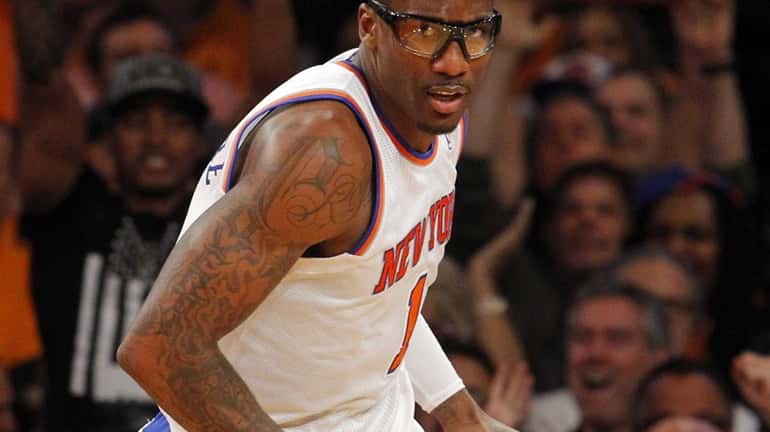 Amar'e Stoudemire looks on during a game against the Miami...
