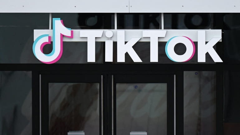 The TikTok logo is displayed on signage outside TikTok social...