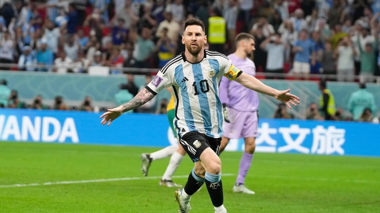 Argentina's Lionel Messi celebrates scoring the opening goal during the...