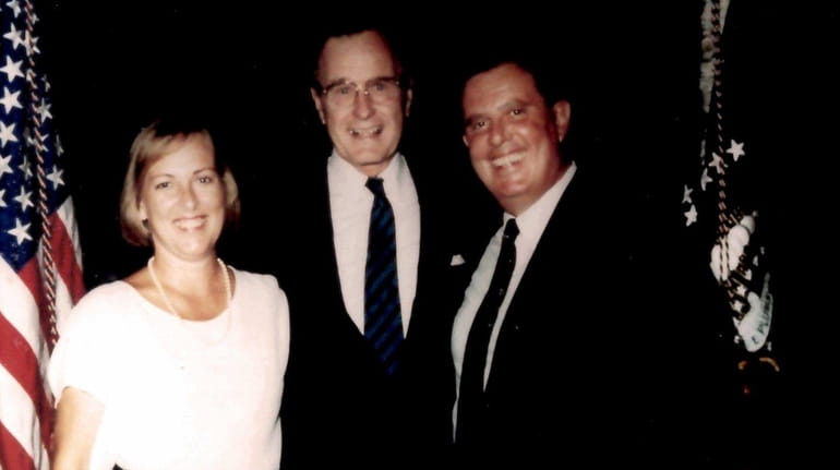 Joseph and Linda Mondello with George H.W. Bush in an...