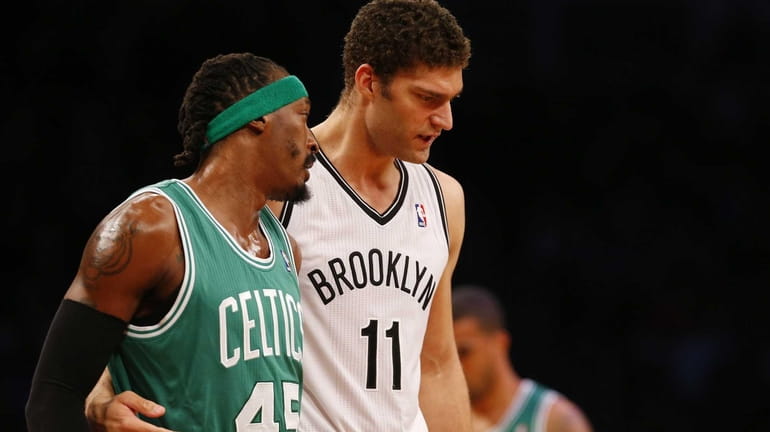 Gerald Wallace of the Boston Celtics and Brook Lopez of...