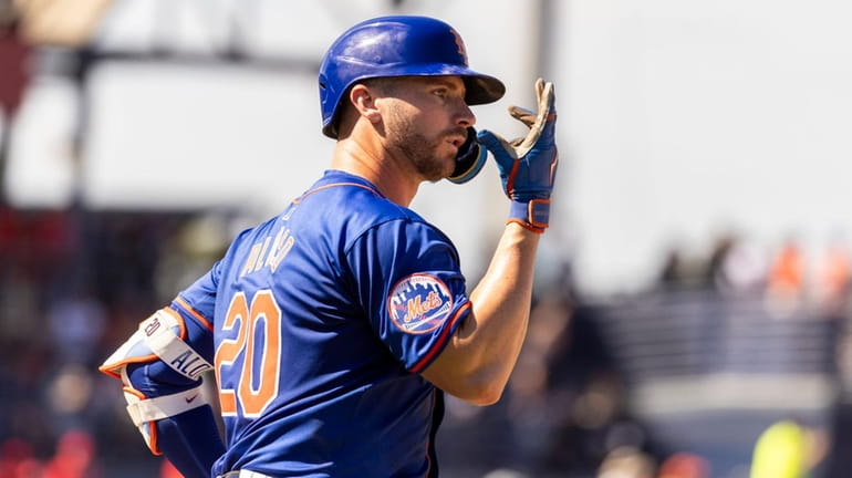 Mets infielder Pete Alonso runs the bases after hitting a...