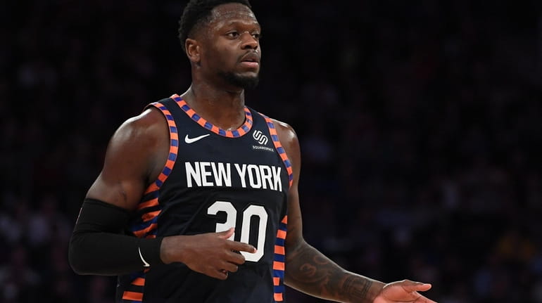 New York Knicks forward Julius Randle looks on against the...