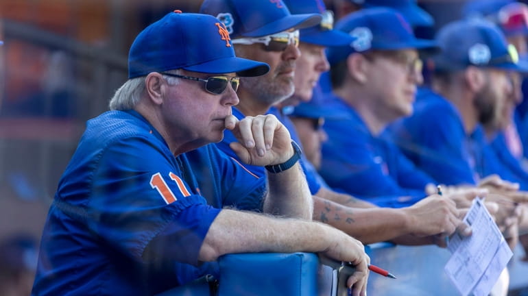 Mets manager Buck Showalter looks on during a spring training...