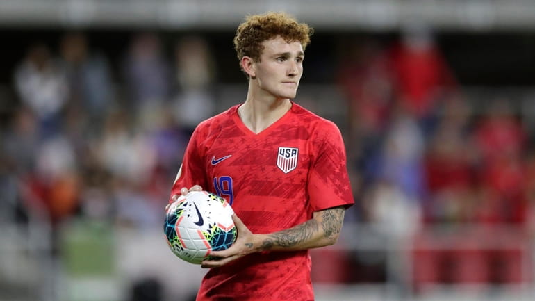 United States' Josh Sargent holds a ball during the second...