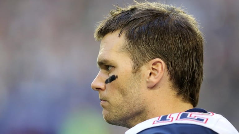 New England Patriots quarterback Tom Brady #12 is seen before...