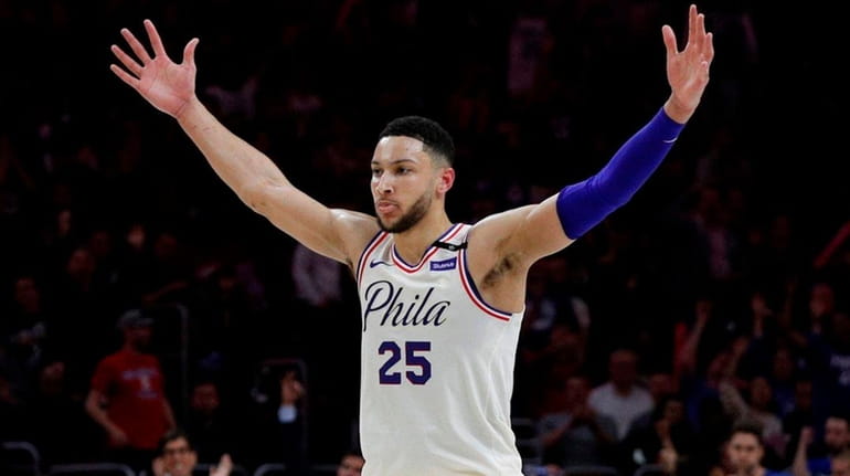 The 76ers' Ben Simmons reacts to his assist during the...