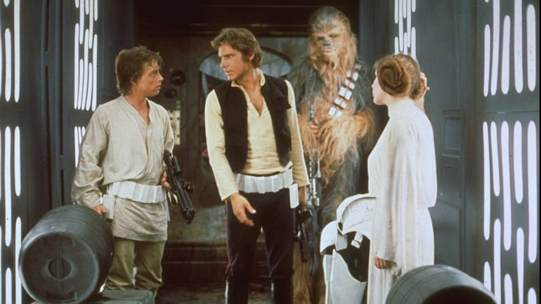 Mark Hamill, Harrison Ford and Carrie Fisher in the original...