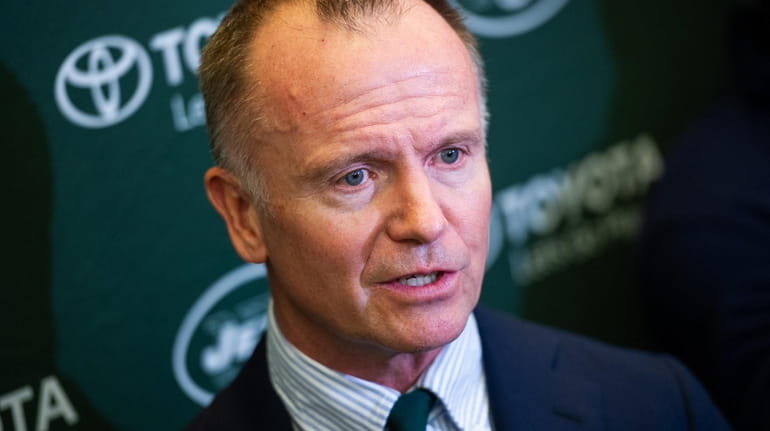 Jets Chairman and CEO Christopher Johnson speaks to the press...