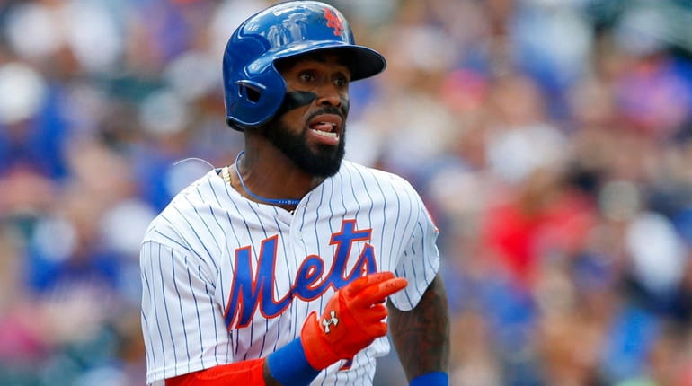 Jose Reyes of the New York Mets grounds out in...