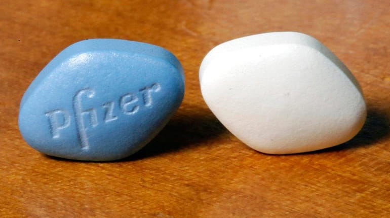 A tablet of Pfizer's Viagra, left, and the company's generic...