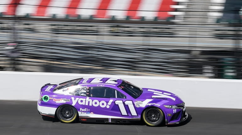 Denny Hamlin drives during a practice session for the NASCAR...
