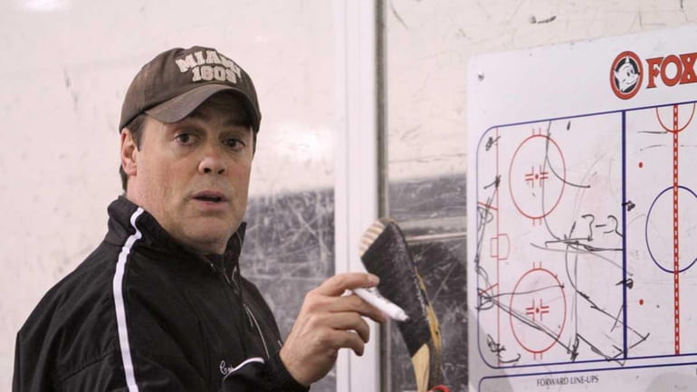 Long Island Royals coach Pat LaFontaine diagrams a drill on...