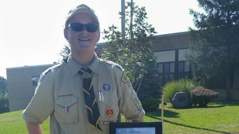 Boy Scout Jordan Waitkus installed pedestals with the names and...