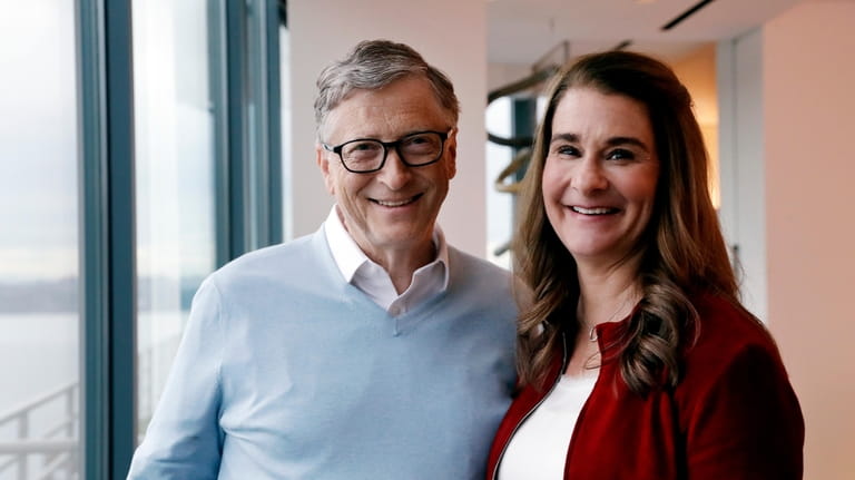 Bill and Melinda Gates pose for a photo in Kirkland,...