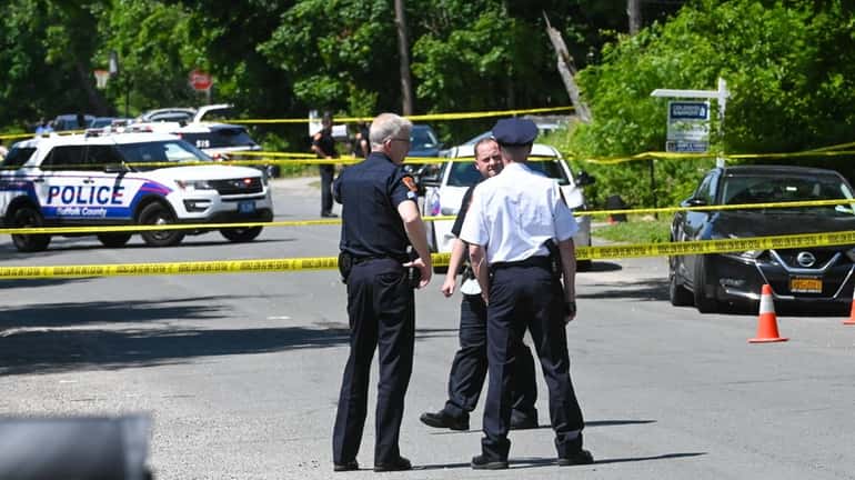 Police at scene where Lee Houpe was shot in the...