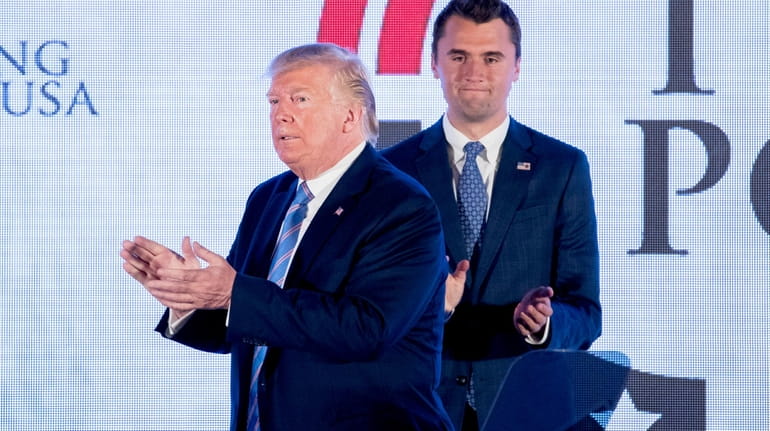 President Donald Trump on Tuesday with Turning Point USA founder...