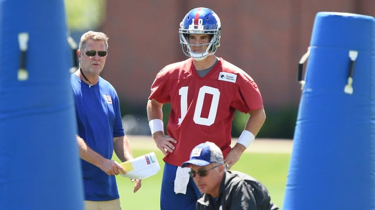New York Giants quarterback Eli Manning looks on during the...