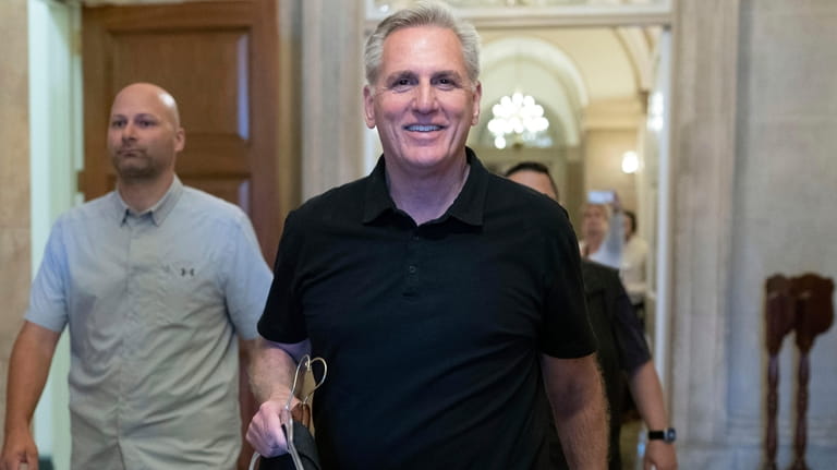 Speaker of the House Kevin McCarthy, R-Calif., walks to leave...