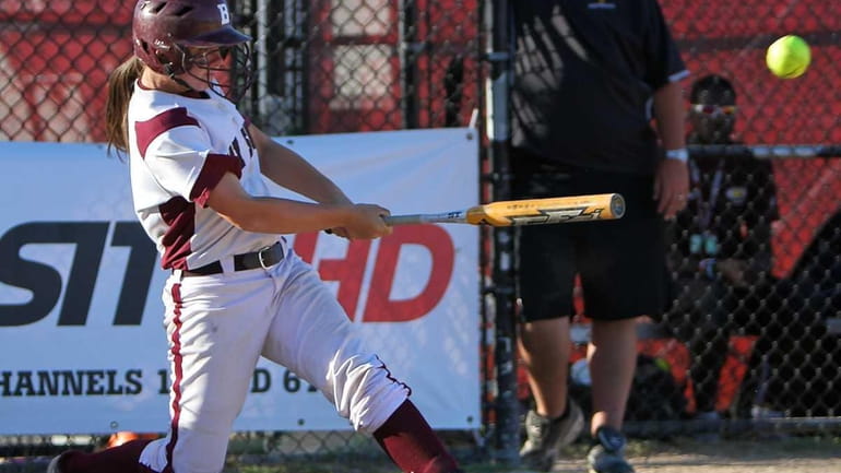 Bay Shore's Courtney Syrett drives a home run to centerfield...