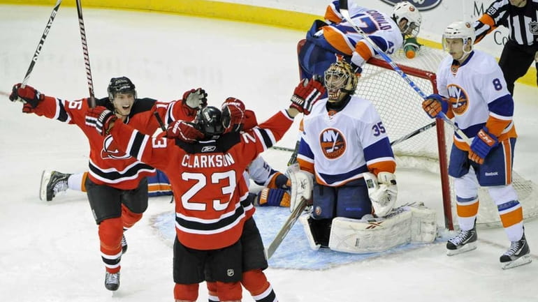 The Devils' David Clarkson (23) celebrates his third-period goal with...