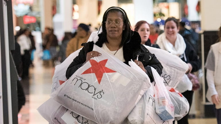 Karen Smith, Brooklyn. Black Friday shoppers at Green Acres Mall,...