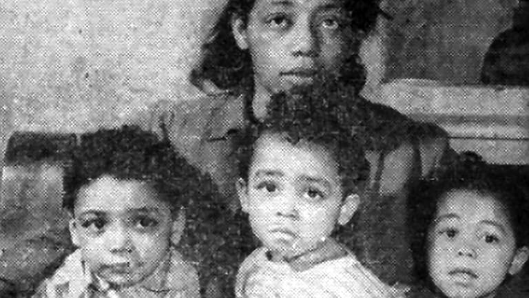 Minnie Ferguson, widow of Charles Ferguson, with their three sons,...
