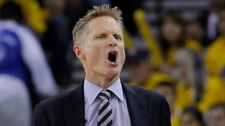 Golden State Warriors head coach Steve Kerr yells during the...