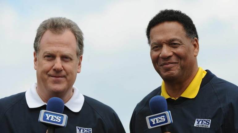 Commentators Michael Kay (left) and Ken Singleton during a pre-game...