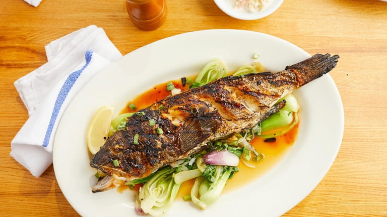 Whole grilled sea bass at Inlet Seafood in Montauk.