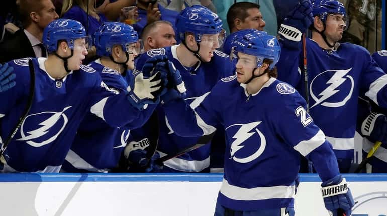 Tampa Bay Lightning center Brayden Point celebrates with the bench...
