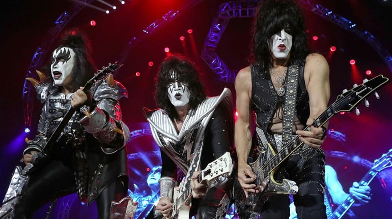 Gene Simmons, Tommy Thayer and Paul Stanley of Kiss, perform...