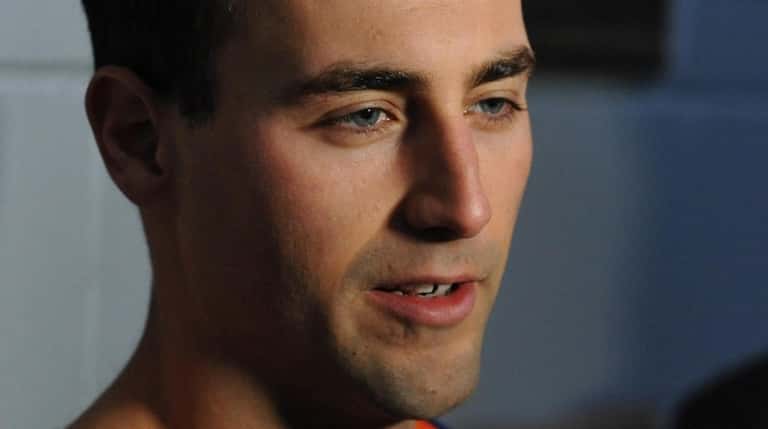 Jordan Eberle #7 of the  Islanders speaks with reporters during...