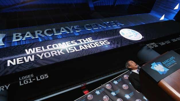 NY Islanders owner Charles Wang announces the team's move to...