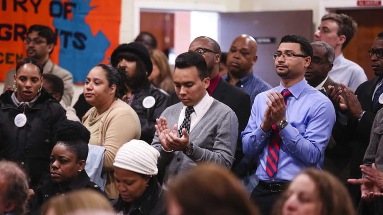Community members attend the Kick-off of Pathways to Citizenship LI...