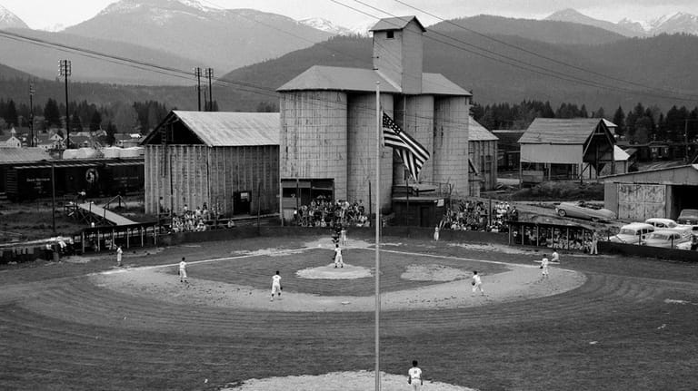 This photo from the 1960s shows a baseball field next...