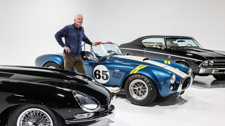 Branston with a 1963 Jaguar, a Shelby Cobra, and a 1969 Chevrolet...