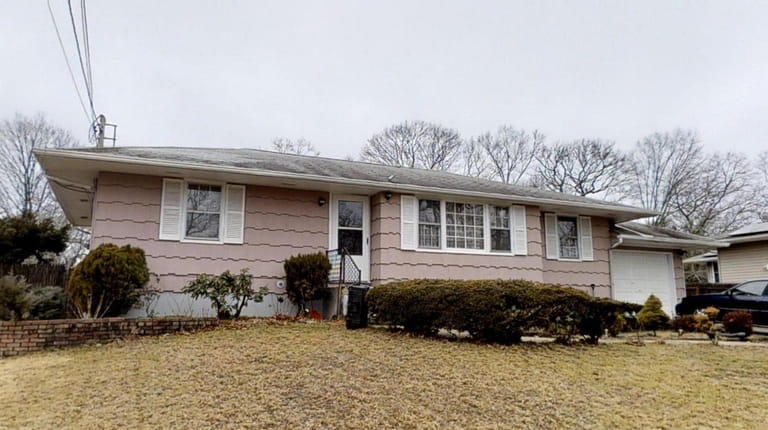 Priced at $339,000, this three-bedroom, one-bathroom ranch in Holtsville was...