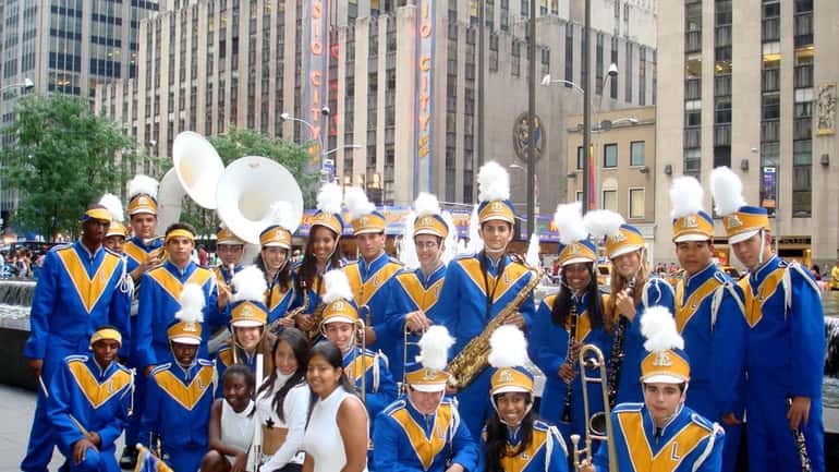 The Lawrence High School marching band performs in several NYC...