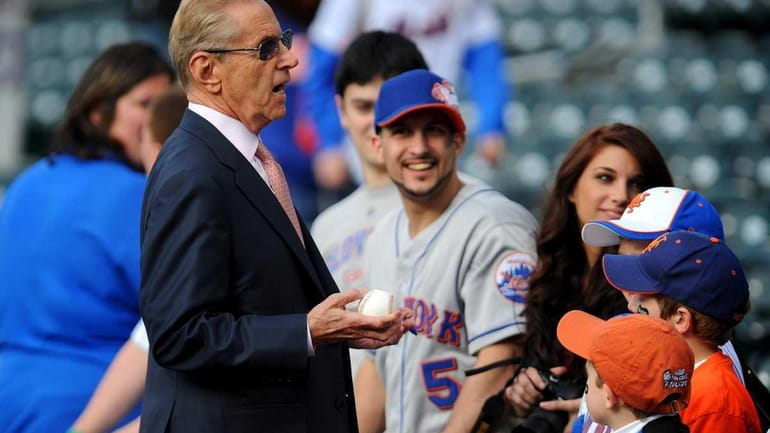 New York Mets owner Fred Wilpon chats with fans before...