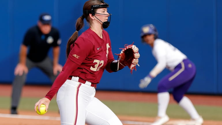 Florida State's Kathryn Sandercock pitches against Washington during the second...
