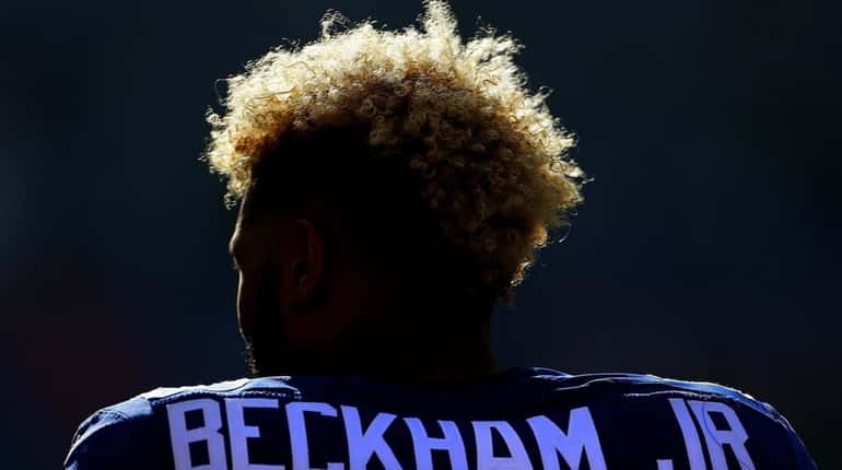 Giants receiver Odell Beckham Jr. stands at attention during the...