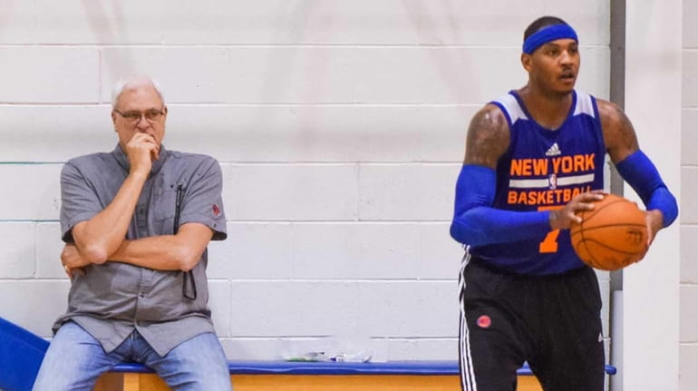 Knicks forward Carmelo Anthony and Knicks president Phil Jackson talk...
