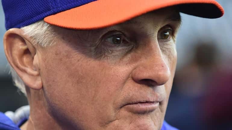 New York Mets manager Terry Collins (10) looks on during...
