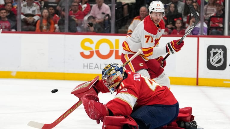 Florida Panthers goaltender Anthony Stolarz (41) defends the goal as...
