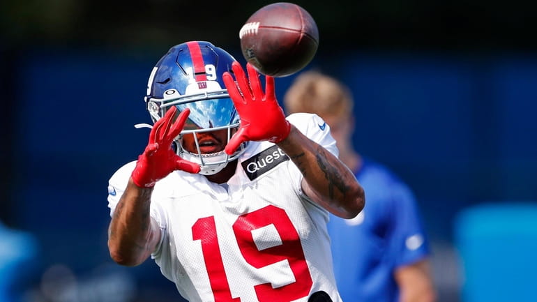 Giants wide receiver Kenny Golladay participates in team drills during training...